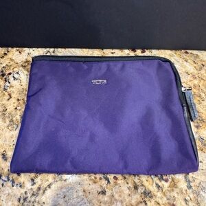 Tumi Purple pouch wallet bag 8”x6” . Zipper travel toiletries /cosmetics storage